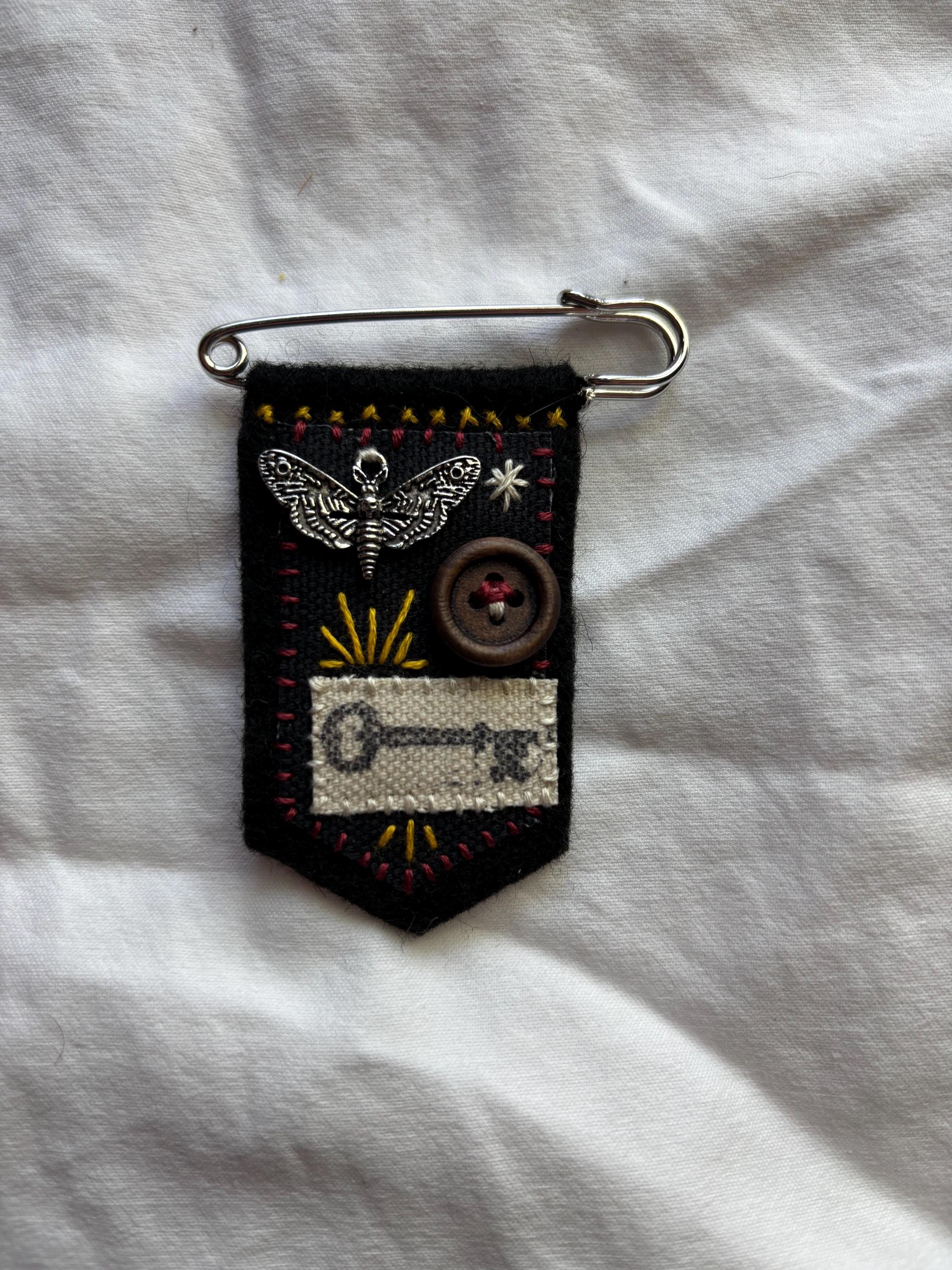 Hand embroidered moth pin