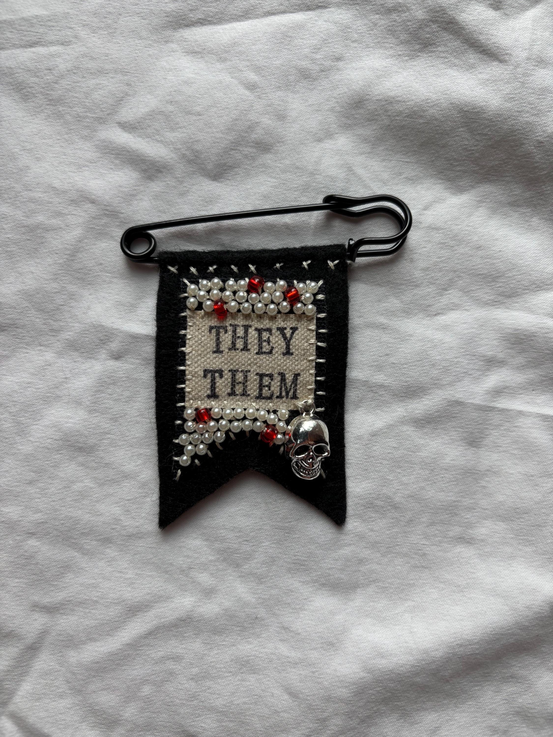 Handmade skull pronoun pin - customizable pronouns