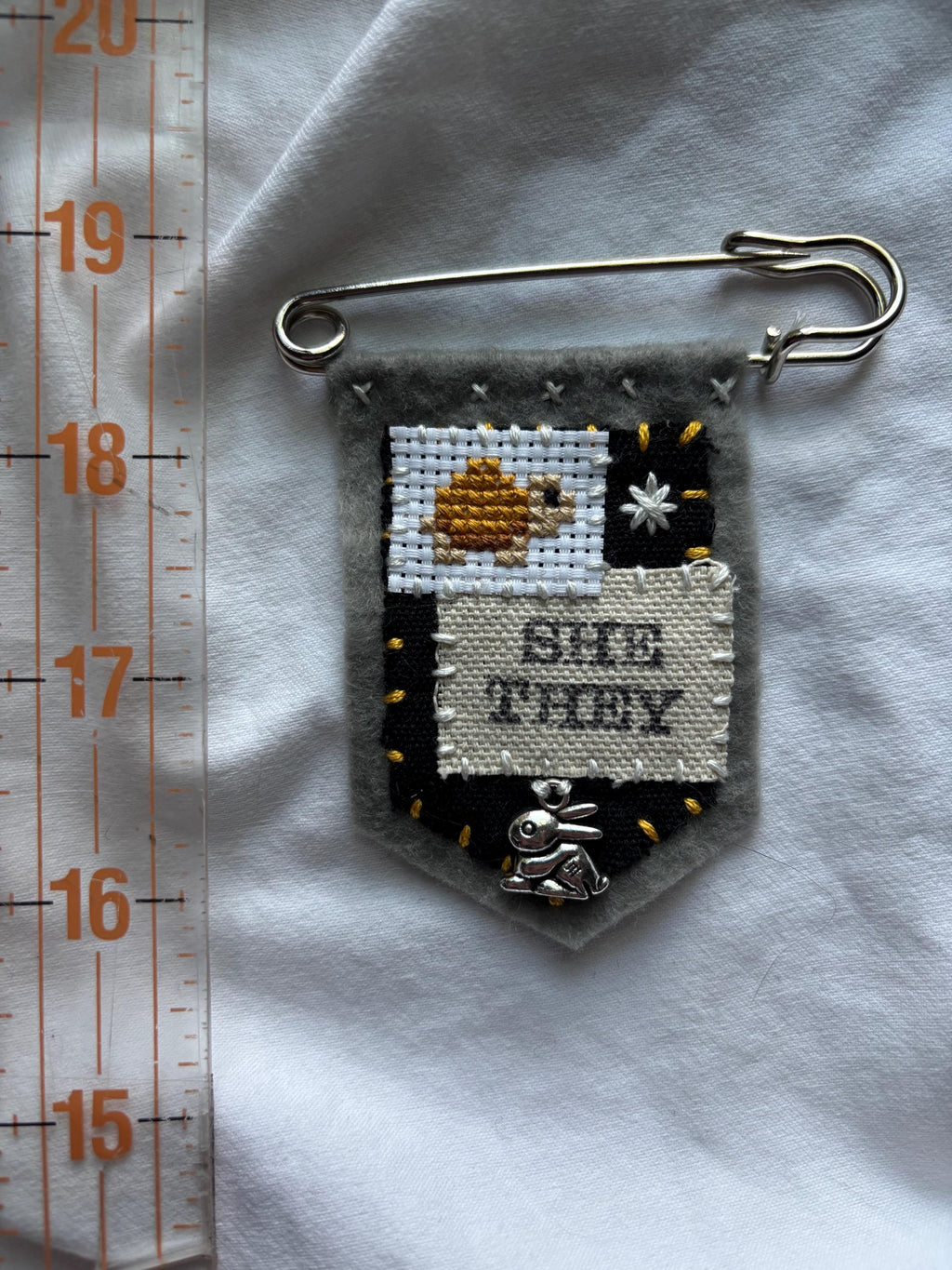 Handmade tortoise pronoun pin - customizable pronouns