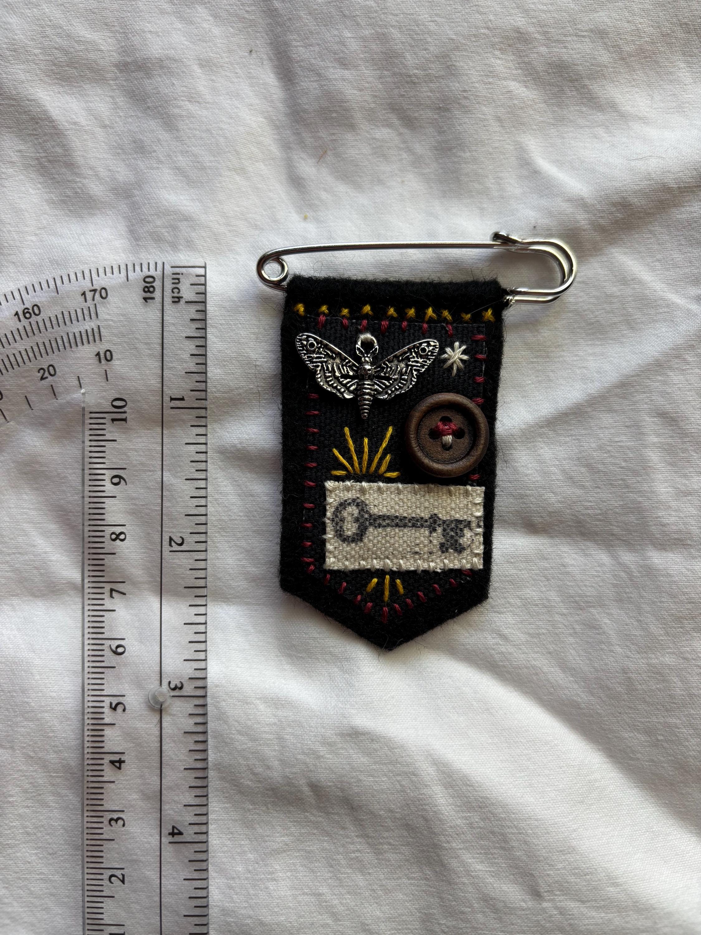 Hand embroidered moth pin